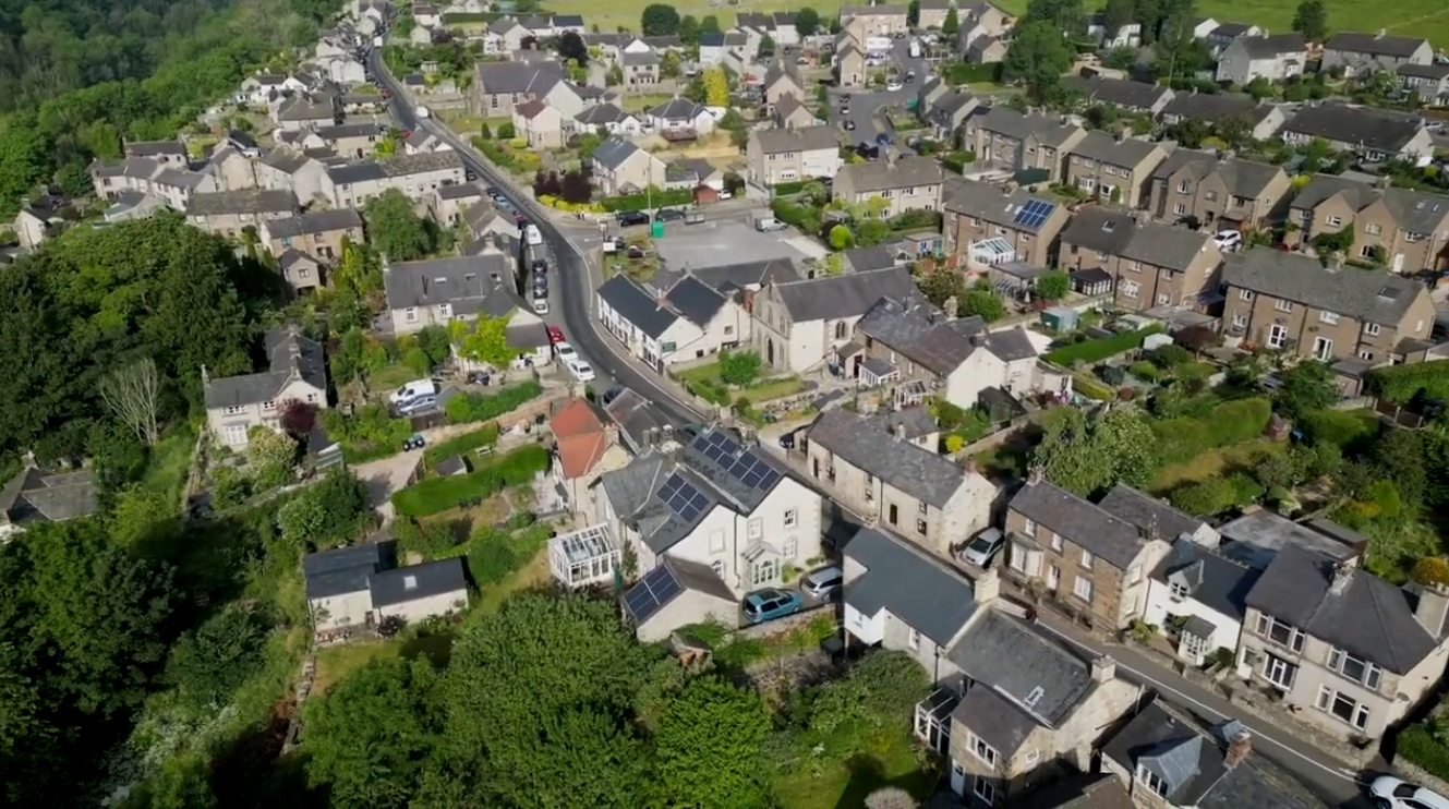 A real aerial view of Youlgrave and the surrounding countryside